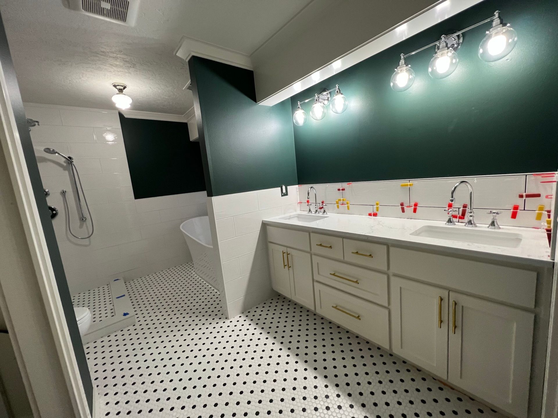 bathroom tile, vanity, and shower